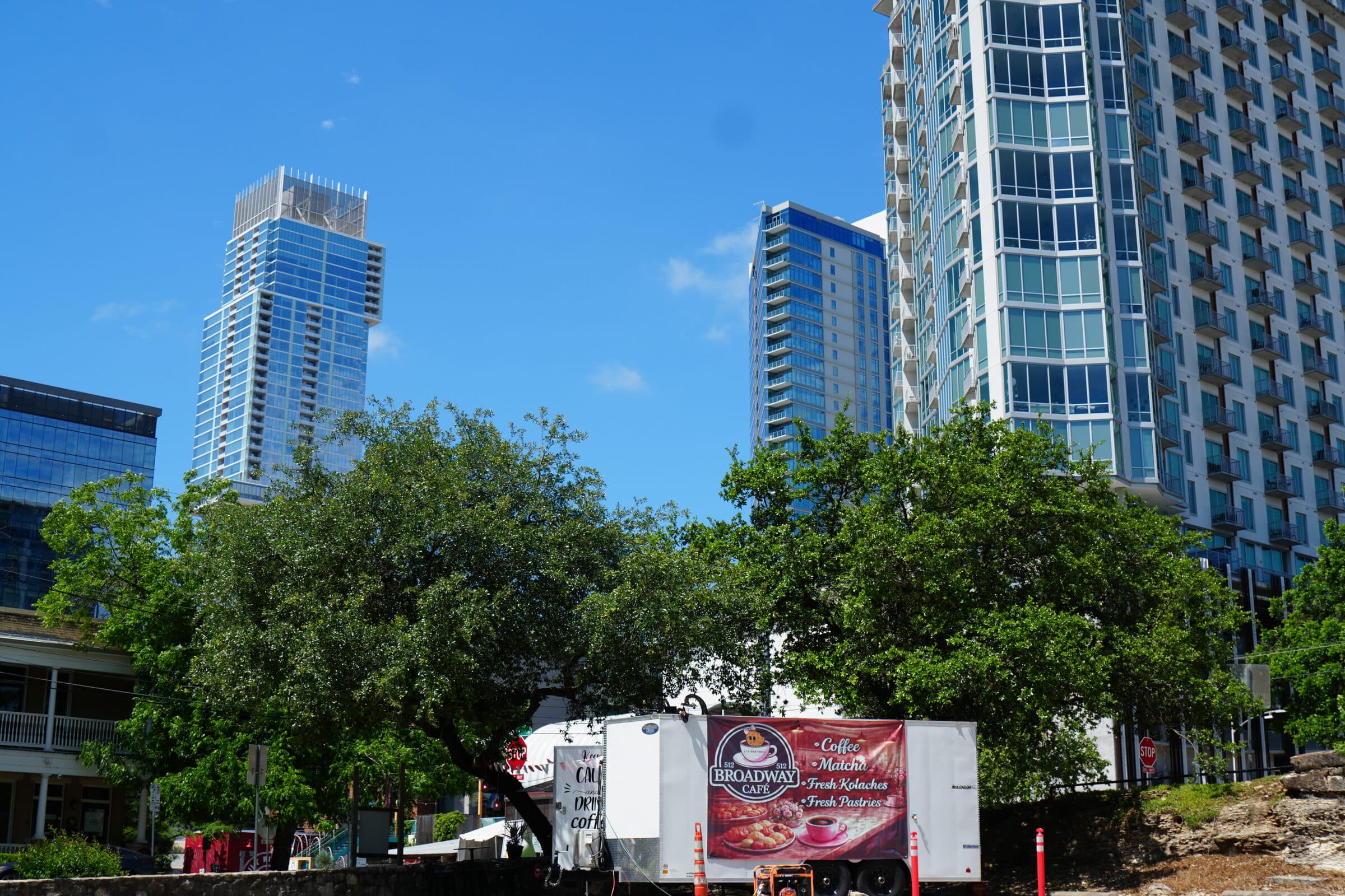 ANW Parking lot with the on-lot coffee truck and the downtown Austin skyline behind